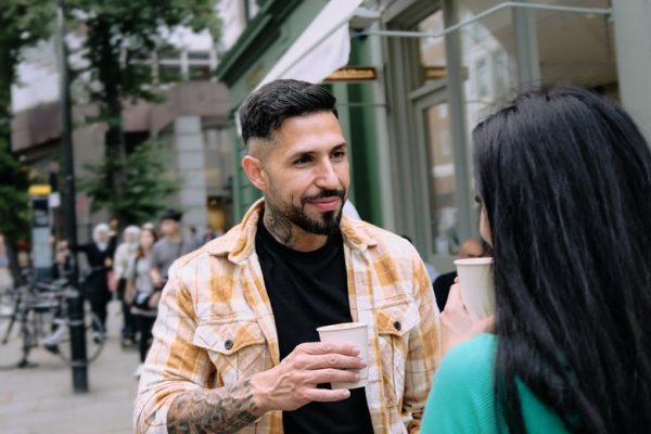 Latin man and his girlfriend drinking coffee 2023 11 27 05 18 25 utc min