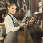 Tattooed barista making coffee in professional cof 2023 11 27 05 02 27 utc min
